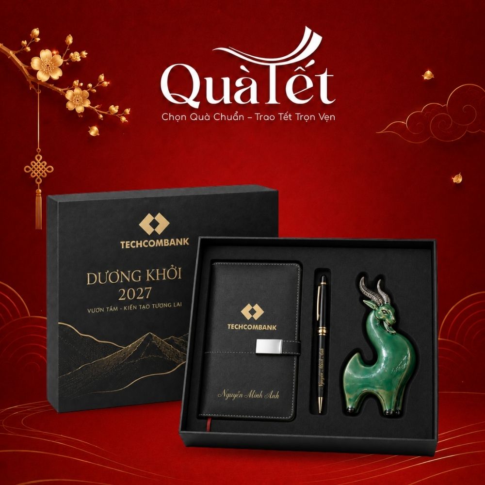 Set quà tặng văn phòng in logo sổ da, bút ký và tượng linh vật gốm sứ